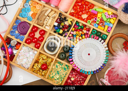 set of accessories and jewelry to embroidery, sewing accessories top view, seamstress workplace, many object for needlework, embroidery, handmade and  Stock Photo