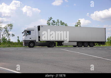 LIPETSK, RUSSIA - 29.05. 2015 White Renault semi-trailer truck at a  interurban road Stock Photo