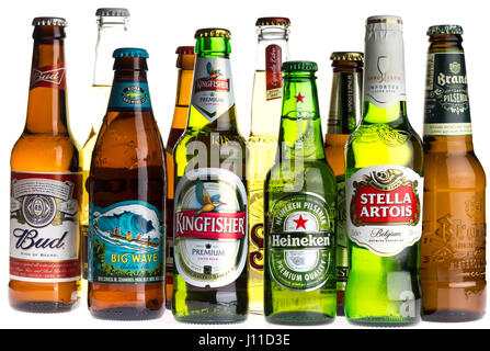 Collection of Budweiser, Kona, Sol, Stella Artois, Brand, Corona, Jupiler, Heineken, Warsteiner and Kingfisher lager beers isolated on a white backgro Stock Photo