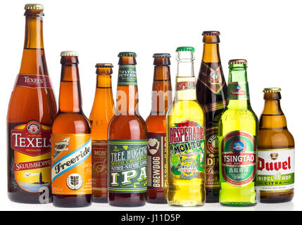 Collection of Texels, Freeride, Monteiths, Flying Dutchman, Brewdog, Desperados, Erdinger, Tsingtao and Duvel beers from all over the world isolated o Stock Photo