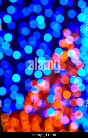 Colored lights background. Abstract backdrop in vertical format Stock Photo
