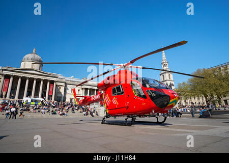 London's Air Ambulance lands at Trafalgar Square in response to a nearby accident, London England United Kingdom UK Stock Photo