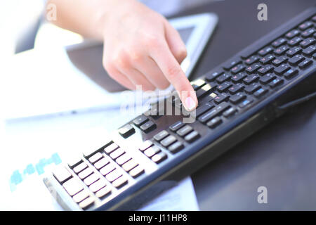 Hands of an office woman typing Stock Photo