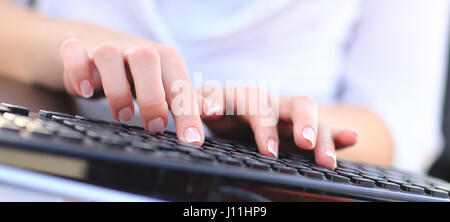Hands of an office woman typing Stock Photo