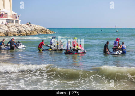 Jet skis waiting at start of race on beach at Spanish Championship april 2017, Jet ski, jetski, Benalmadena, Andalusia, Spain. Stock Photo