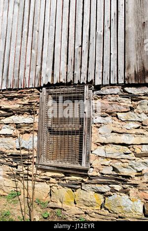 Side wall of an old barn Stock Photo