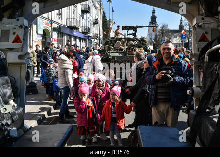 Polish citizens attend a vehicle static display in Piotrkow Trybunalski, Poland, during a stop on the Battle Group Poland convoy, March 28, 2017. The contingency of U.S., United Kingdom and Romanian Soldiers convoyed to Orzysz, Poland where they will integrate with the Polish 15th Mechanized Brigade, 16th Infantry Division. . The battle group will be based in Poland for a six month rotation for NATO’s Enhanced Forward Presence. NATO's eFP is an allied, forward deployed defense and deterrence posture in Eastern Europe to protect and reassure NATO's Eastern member states of their security. (U.S. Stock Photo