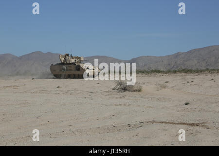 U.S. Soldiers assigned to 3rd Battalion, 69th Armor Regiment, conduct maneuverability movements inside a M2 Bradley Fighting Vehicle during Decisive Action Rotation 17-05 at the National Training Center in Fort Irwin, Calif., Apr. 2nd, 2017.(U.S. Army photo by Spc. Zachary N. Stanley, Operations Group, National Training Center) Stock Photo