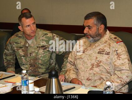 Maj. Gen. William B. Hickman, deputy commanding general of U.S. Army Central, and Maj. Gen. Khaled Saleh Al-Sabah, the Kuwait land forces commander discuss the way forward as they continue to build an enduring partnership.  (U.S. Army photo by Staff Sgt. Jared Crain) Stock Photo