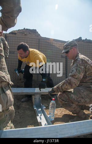 Army civilians and Soldiers in Romania assemble track for the Theissen ...