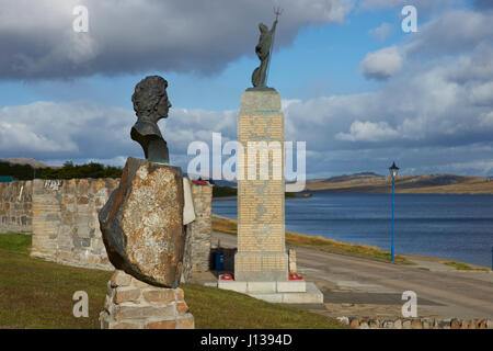 Statue of Margaret Thatcher next to the Liberation Monument in Stanley, capital of the Falkland Islands. Stock Photo