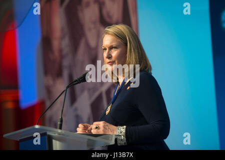 Bonnie Carroll, Tragedy Assistance Program for Survivors President and Founder, delivers remarks during the TAPS 2017 Honor Guard Gala in Washington, D.C., April 12, 2017. During the event, the National Basketball Association and USA Basketball were awarded the inaugural National Community Partnership Award, presented for the support they have shown for the Nation’s military families and personal engagement with the surviving families of America’s fallen heroes. Stock Photo