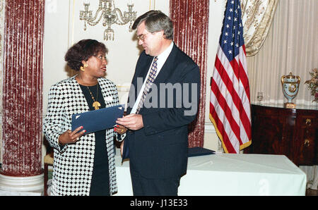 woman accepting award taking a picture Stock Photo