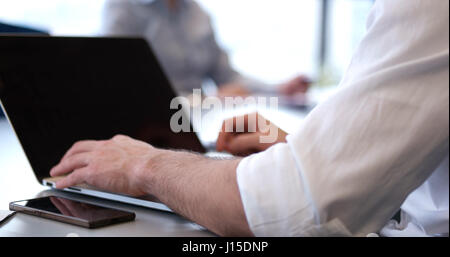 business people having meeting in bright office making plans for business Stock Photo