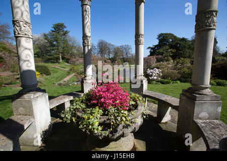 Cholmondeley Castle Gardens. Picturesque spring view of azalea’s in full bloom at Cholmondeley Castle’s Temple Garden arbour. Stock Photo