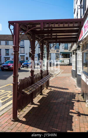 Vintage bus shelter with seats at Low Town, Bridgnorth, Shropshire, England, UK. Stock Photo