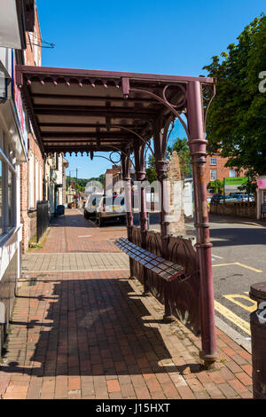 Vintage bus shelter with seats at Low Town, Bridgnorth, Shropshire, England, UK. Stock Photo