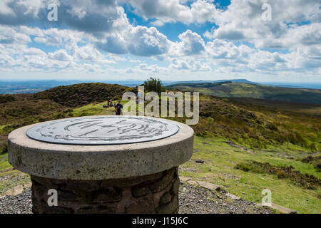 The viewpoint indicator (toposcope) on the summit of Brown Clee Hill, Shropshire, England, UK.  With Titterstone Clee Hill in the far distance. Stock Photo