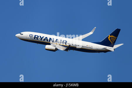 Ryanair Boeing 737-800 banking left after taking off from El Prat Airport in Barcelona, Spain. Stock Photo