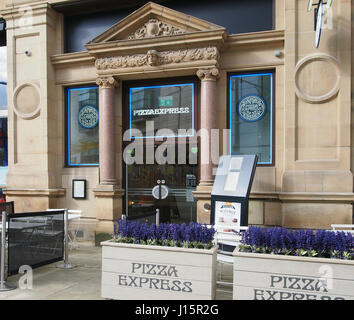 Pizza Express fast food outlet and restaurant in the Corn Exchange building in the city centre center of Manchester, England, UK. Stock Photo