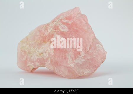 Rose quartz crystal rock isolated on white background Stock Photo