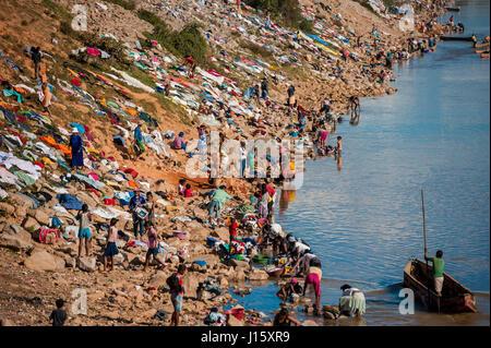 Washing clothes in the Ikopa River in the Madagascan capital of Antananarivo Stock Photo