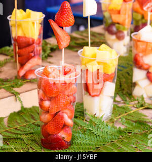 Fruit salad in plastic cups Stock Photo