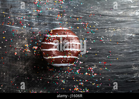 Donuts on black background. Top view with copy space Stock Photo