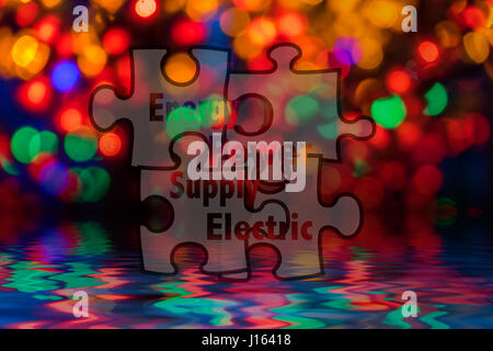 Jigsaw shape and conceptual text with bokeh blur background. Stock Photo