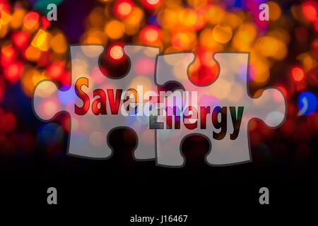 Jigsaw shape and conceptual text with bokeh blur background. Stock Photo