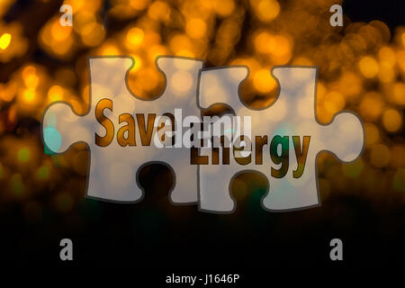 Jigsaw shape and conceptual text with bokeh blur background. Stock Photo