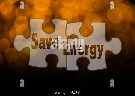 Jigsaw shape and conceptual text with bokeh blur background. Stock Photo