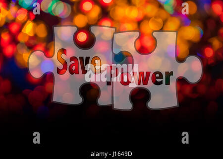 Jigsaw shape and conceptual text with bokeh blur background. Stock Photo