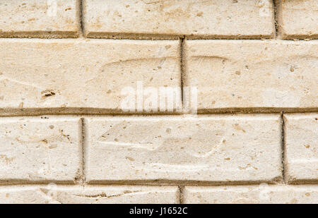 Background from a brickwall made of sand Stock Photo