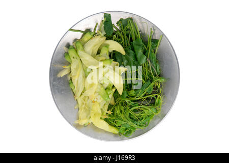 Boiled coccinia grandis and sesbania grandiflora vegetables on stainless steel plate isolated on white background Stock Photo