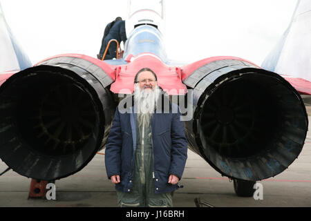 MOSCOW, RUSSIA: COULD THIS be the world’s most religious wannabe cosmonaut? Pictures show how the bearded Russian Orthodox priest practices his zero-G skills, travelled in a MiG fighter on a journey to the edge of space and most importantly takes the last confession of Russian cosmonauts before they leave the surface of our planet. Father Hegumen Iov is responsible for the souls of nearly all Russia’s cosmonauts, but the rector of Transfiguration Church in Russia’s Star City took his life in his hands by travelling in a MiG-29UB at 1,100 miles-per hour at over 11-miles above the surface of Ear Stock Photo