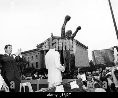 Photograph of Mayor Bill Green presenting a 'Rocky' statue with fans and friends to Sylvester Stallone at the premiere of Rocky III in Philadelphia, PA in 1982. © mpi09 / MediaPunch Photograph of the Premiere of Rocky II at the Philadelphia Museum of Art in Philadelphia, PA in 1979. Stock Photo