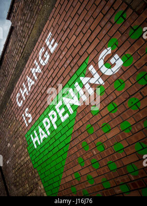 Change is happening sign painted on brick wall, Hull, UK. Stock Photo