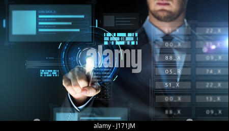 businessman touching virtual screen projection Stock Photo
