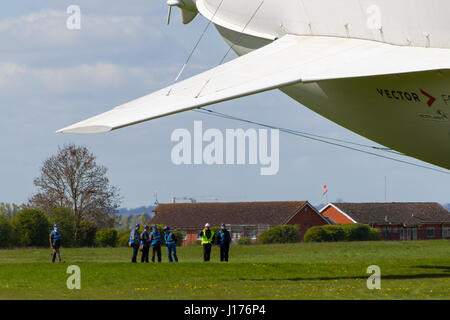 Cardington, UK. 18th Apr, 2017. The Hybrid Air Vehicles Airlander 10 is moored to the new Mobile Mooring Mast (MMM), an integrated tracked vehicle and mooring mast, which makes it easier to control and ”push back” the Airlander when manoeuvering it around the airfield. The aircraft is almost ready to begin it's 2017 flight test programme. An Auxiliary Landing System (ALS) has been added which allows the aircraft to land safely at a greater range of landing angles. Photo Credit: Mick Flynn/Alamy Live News Stock Photo