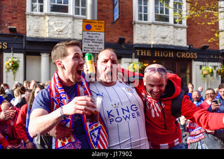 Leicester, UK. 18th Apr 2017. Leicester City FC and Atletico Madrid fans gather in Jubilee Square ahead of tonight's Champions League game at the King power stadium.Fans were mainly in high sprites but fighting broke out between rival supporters, Police move in and got the situation back under control. Credit: Ian Francis/Alamy Live News Stock Photo