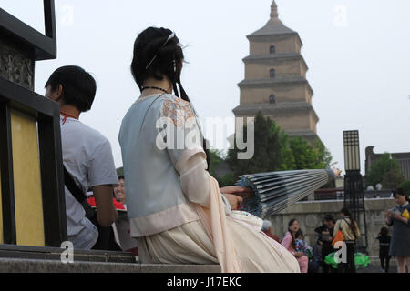 April 18, 2017 - Xi'An, Xi'an, China - Xi'an, CHINA-April 18 2017: (EDITORIAL USE ONLY. CHINA OUT) .A girl wearing traditional Chinese clothing at the scenic spot of Giant Wild Goose Pagoda in Xi'an, northwest China's Shaanxi Province, April 18th, 2017. The girl Liu Jingxuan, a big fan of traditional Han culture and clothing, wears traditional dress in her daily life. Credit: SIPA Asia/ZUMA Wire/Alamy Live News Stock Photo
