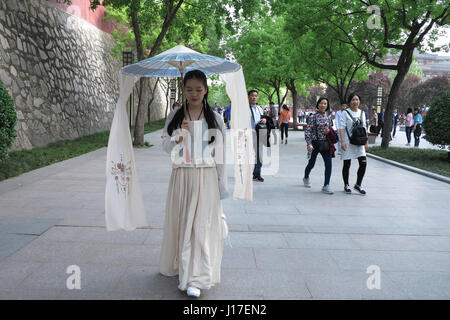 April 18, 2017 - Xi'An, Xi'an, China - Xi'an, CHINA-April 18 2017: (EDITORIAL USE ONLY. CHINA OUT) .A girl wearing traditional Chinese clothing at the scenic spot of Giant Wild Goose Pagoda in Xi'an, northwest China's Shaanxi Province, April 18th, 2017. The girl Liu Jingxuan, a big fan of traditional Han culture and clothing, wears traditional dress in her daily life. Credit: SIPA Asia/ZUMA Wire/Alamy Live News Stock Photo