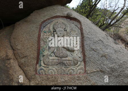 Fuxin, China. 18th Apr, 2017. Buddhist cliff carvings at Haitang Mountain in Fuxin, northeast China's Liaoning Province, April 18th, 2017. More than 260 carvings of Buddha can be seen at the Haitang Mountain. Credit: SIPA Asia/ZUMA Wire/Alamy Live News Stock Photo