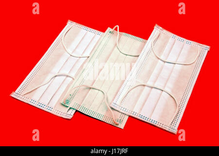 Three disposable medical masks Stock Photo