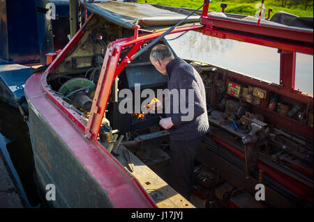 Brian Greaves blacksmith on a canal boat Stock Photo