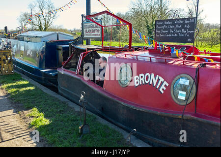 Brian Greaves blacksmith at work on his mobile smithy in a canal boat Stock Photo