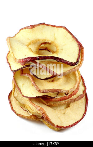 homemade dried apple rings isolated on white background Stock Photo