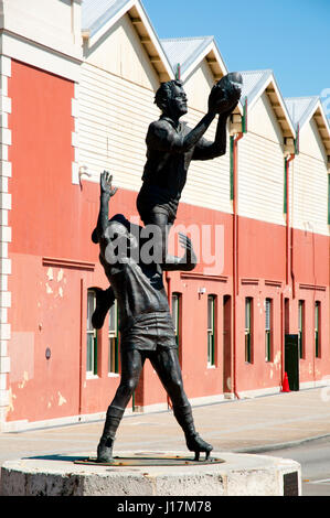 FREMANTLE, AUSTRALIA - October 26, 2016: Statue of John Gerovich's famous mark over Ray French in Australian footy Stock Photo