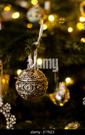 Christmas tree lights and decorations, hanging baubles, christmas scene Stock Photo